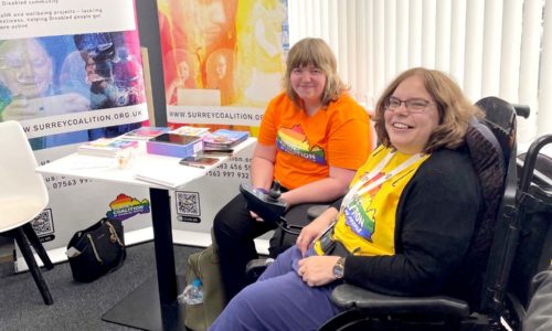 Angie and Lucie promoting the work of Surrey Coalition of Disabled People at an event