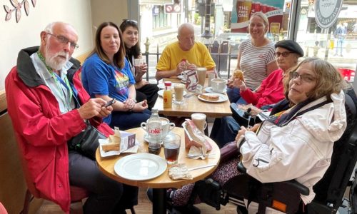 Access All Areas - Coalition members around cafe table