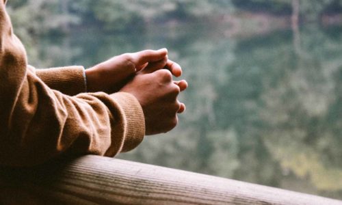 Photo of hands clasped