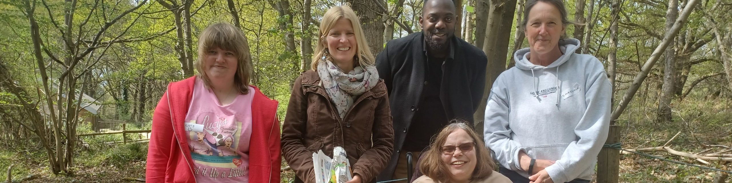 A few of the staff team in Nower Wood smiling