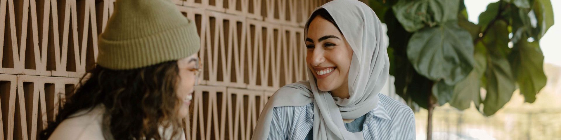 Two women talking and smiling