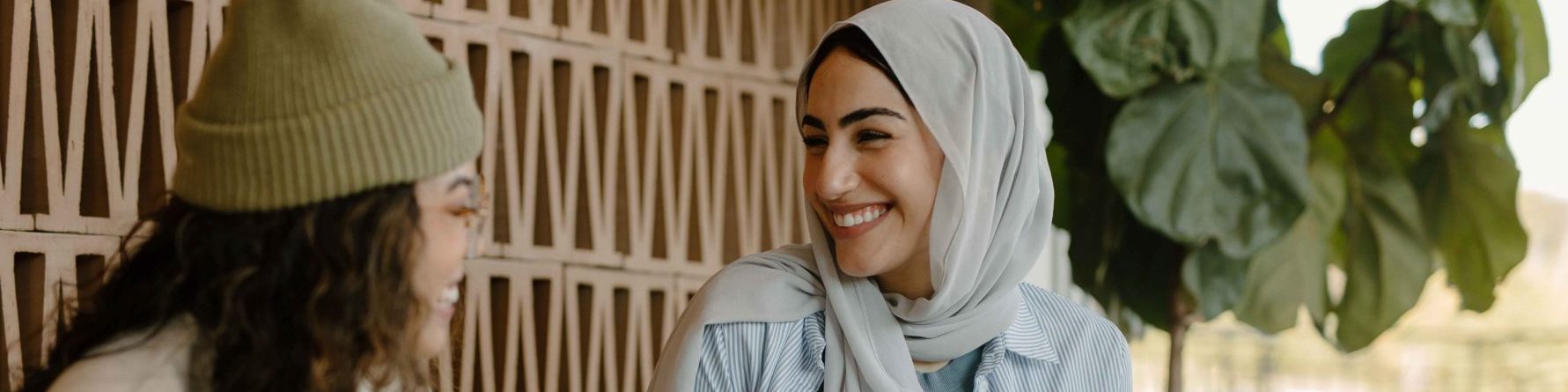 Two women talking and smiling