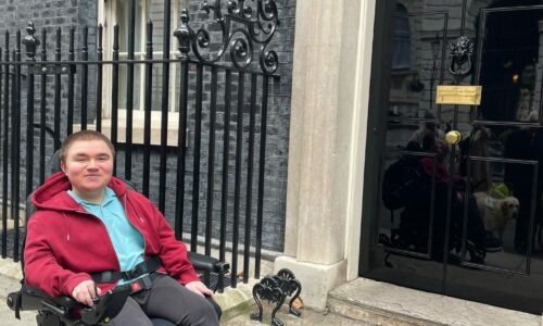 Coalition member in front of the Number 10 Downing Street door