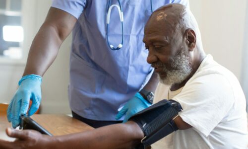 Person having their blood pressure checked