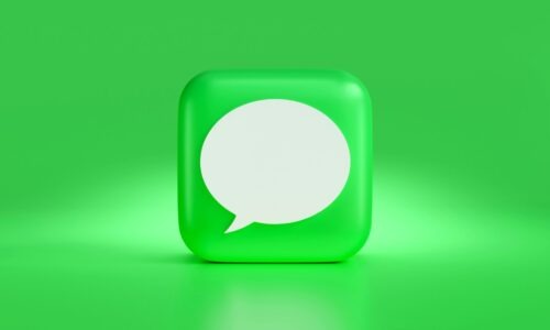text message symbol with a green background and white speech bubble