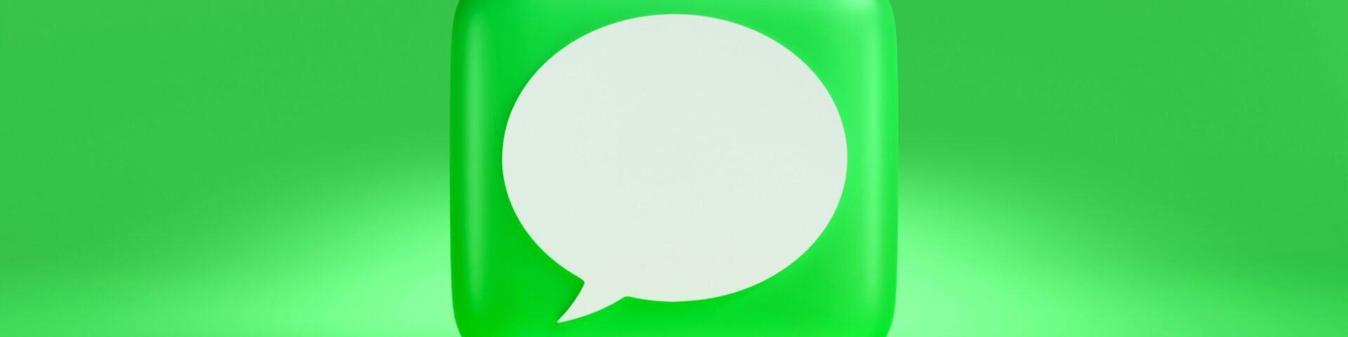 text message symbol with a green background and white speech bubble