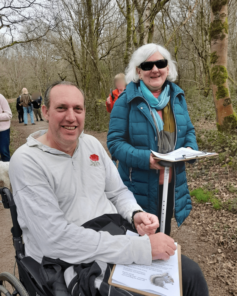 Coalition members at the growing together event at Newlands Corner, in a wooded area. 