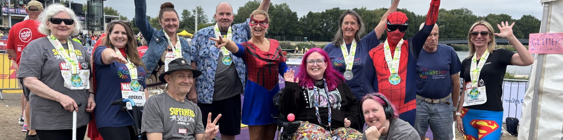 Group photo of Coalition members and staff at the Superhero Tri event.