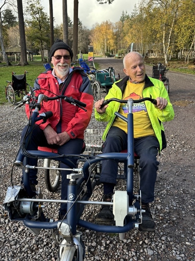 Coalition members on a side by side tandem bike.
